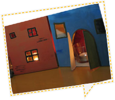 Häuser aus Pappe mit Teelicht innen